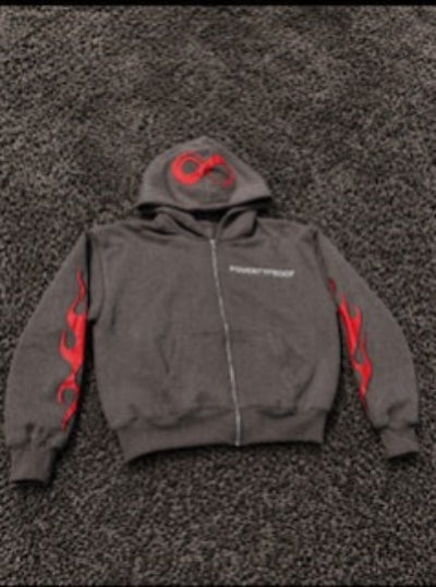 Gray hoodie with red graphics and text on a textured gray background